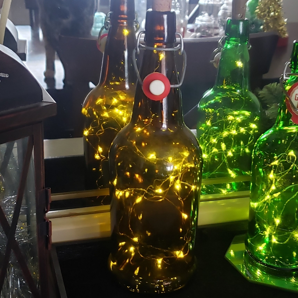 Vintage amber glass bottle with fitted string lights